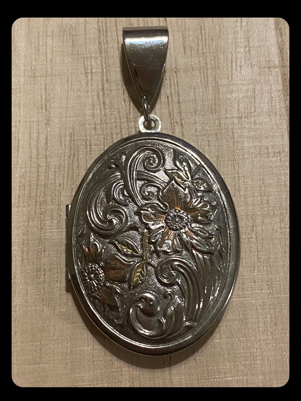 Vintage Oval Locket Pendant Featuring Embossed Floral & Scroll Repoussè Design